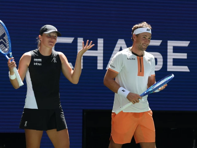 casper ruud r and iga swiatek react after a point against madison keys and frances tiafoe during their mixed doubles match at the us open photo afp