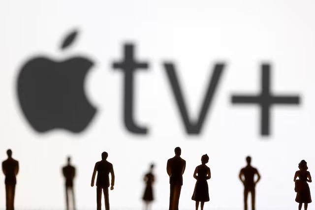 toy figures of people are seen in front of the displayed apple tv logo in this illustration taken january 20 2022 photo reuters