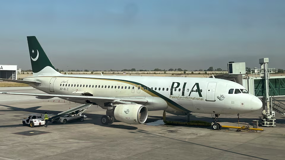 view of a pakistan international airlines pia passenger plane taken through a glass panel at islamabad international airport pakistan october 3 2023 photo reuters file