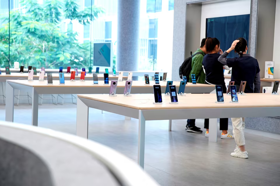 smartphones are displayed in huawei s first global flagship store in shenzhen guangdong province china october 30 2019 photo reuters