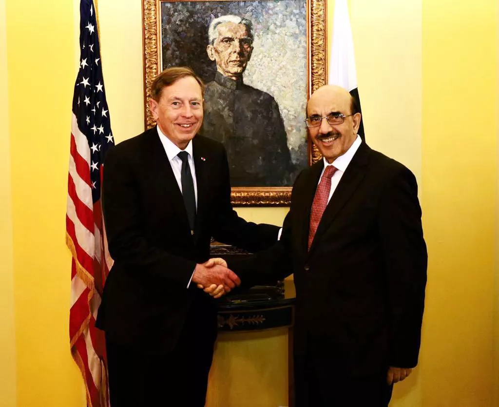 pakistan s ambassador to the united states masood khan with retired us general david h petraeus