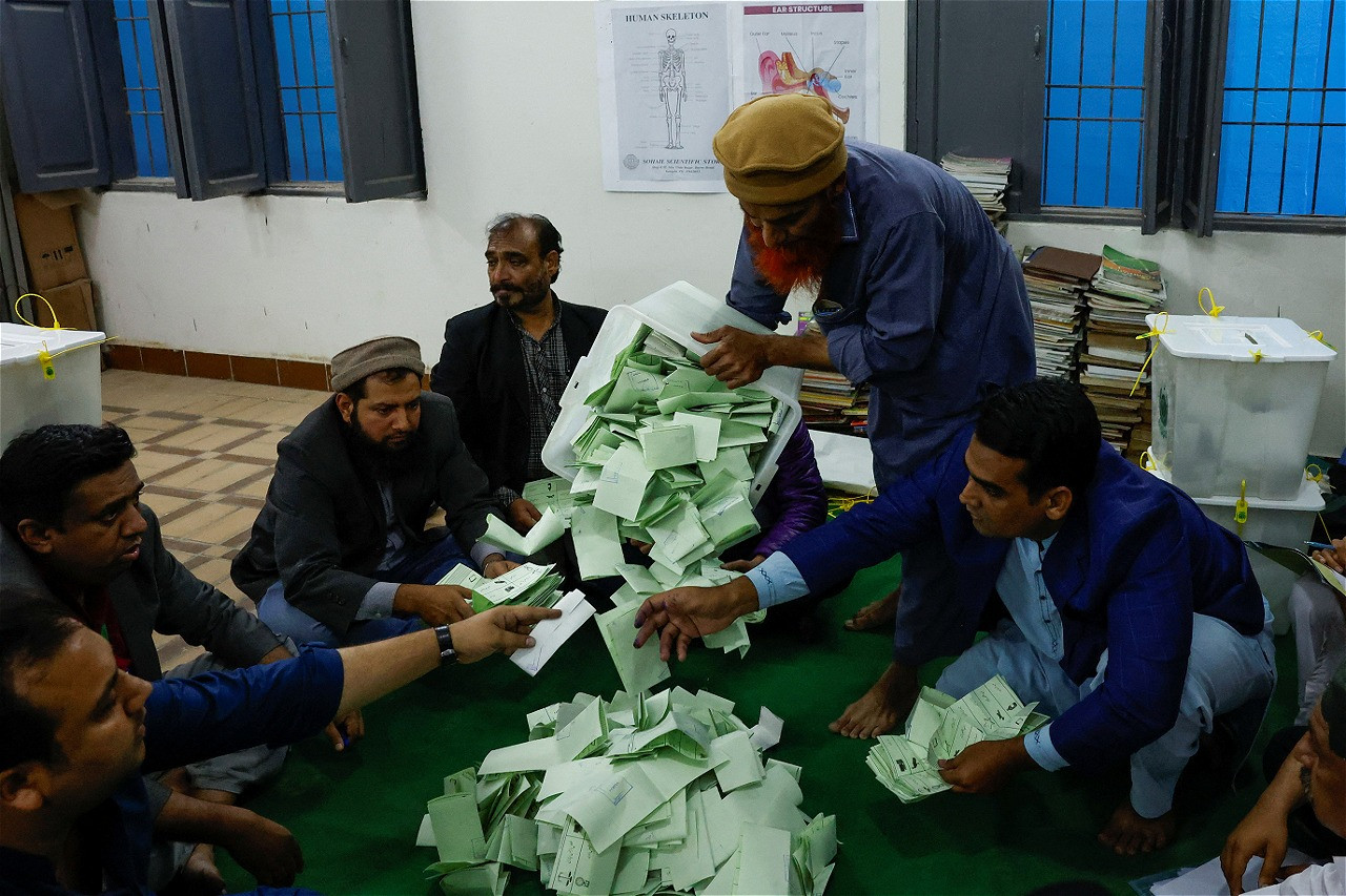 polling officers count ballot papers during the general election in karachi february 8 2024 photo reuters