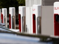 tesla cars are seen next to the v3 supercharger equipment during the presentation of the new charge system in the euref campus in berlin germany september 10 2020 photo reuters