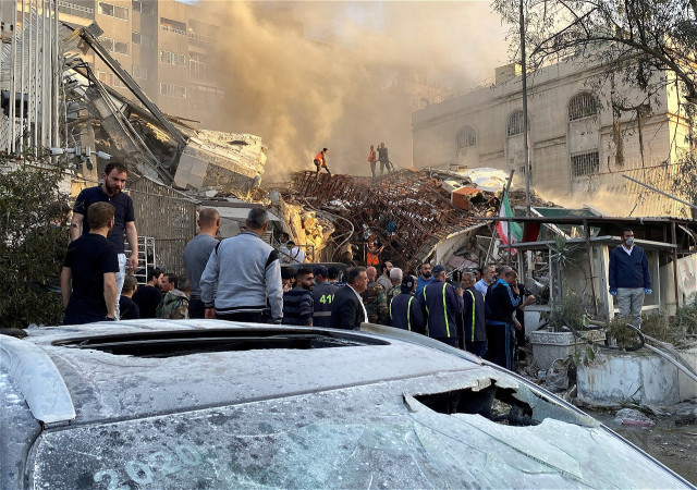 smoke rises after what the iranian media said was an israeli strike on a building close to the iranian embassy in damascus syria april 1 2024 photo reuters