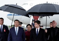 france s prime minister gabriel attal china s president xi jinping and his wife peng liyuan walk under umbrellas upon their arrival for an official two day state visit at orly airport south of paris on may 5 2024 photo reuters