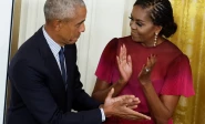 former president barack obama and former first lady michelle obama react during the unveiling of their official white house portraits in the east room of the white house in washington september 7 2022 photo reuters