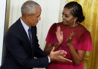 former president barack obama and former first lady michelle obama react during the unveiling of their official white house portraits in the east room of the white house in washington september 7 2022 photo reuters