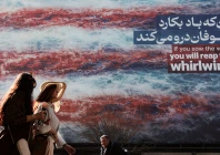 iranian women walk past an anti u s billboard in tehran iran february 19 2026 reuters iranian women walk past an anti u s billboard in tehran iran february 19 2026 reuters