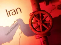 a map showing the strait of hormuz and iran is seen behind a 3d printed oil pipeline in this illustration taken june 22 2025 reuters