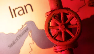 a map showing the strait of hormuz and iran is seen behind a 3d printed oil pipeline in this illustration taken june 22 2025 reuters