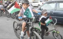 cyclists rally across karachi in solidarity with palestine