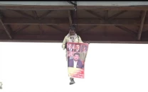 man rescued hanging from bridge with tessori poster