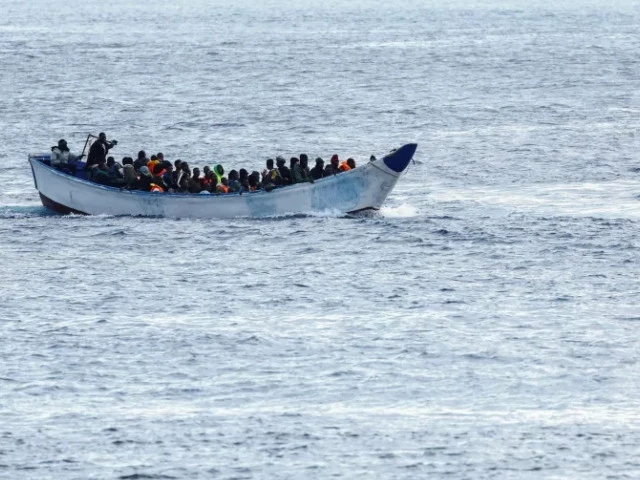 a boat with migrants arrives at the port of la restinga on the island of el hierro spain photo reuters a boat with migrants arrives at the port of la restinga on the island of el hierro spain photo reuters