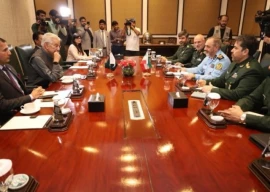 pakistan iran defence ministers vow to boost security ties pakistan iran defence ministers vow to boost security ties
