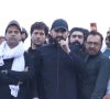 k p chief minister sohail afridi addressing participants of the pti long march in lachi tehsil of kohat on monday screengrab pti x