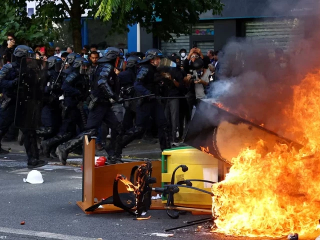 french crs riot police run past objects set on fire amid clashes with protesters during a demonstration by high school and university students supported by teachers union and school parents as part of a nationwide day of demonstrations and blockades voicing anger over overcrowded classrooms teacher shortages and dilapidated school buildings which students blame on years of underinvestment in paris france october 6 2026 reuters french crs riot police run past objects set on fire amid clashes with protesters during a demonstration by high school and university students supported by teachers union and school parents as part of a nationwide day of demonstrations and blockades voicing anger over overcrowded classrooms teacher shortages and dilapidated school buildings which students blame on years of underinvestment in paris france october 6 2026 reuters