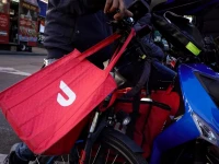 a doordash delivery bag is seen in brooklyn new york city us may 9 2022 reuters