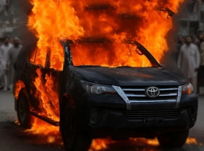 speeding suv kills man in karachi mob sets vehicle on fire