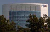 the logo of the adani group is seen on the facade of its corporate house on the outskirts of ahmedabad india november 22 2024 reuters the logo of the adani group is seen on the facade of its corporate house on the outskirts of ahmedabad india november 22 2024 reuters