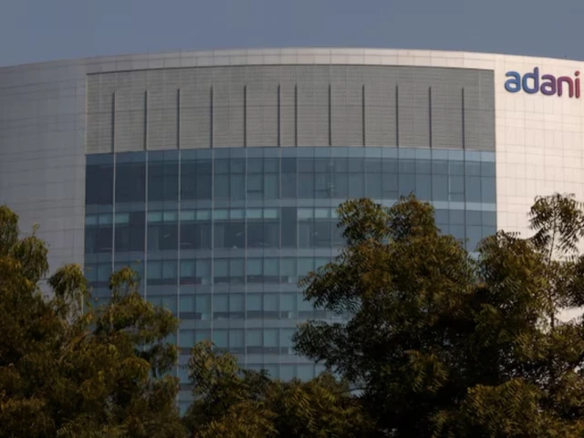 the logo of the adani group is seen on the facade of its corporate house on the outskirts of ahmedabad india november 22 2024 reuters the logo of the adani group is seen on the facade of its corporate house on the outskirts of ahmedabad india november 22 2024 reuters