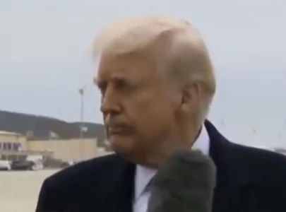 watch awkward moment as trump gets hit by reporter s microphone watch awkward moment as trump gets hit by reporter s microphone