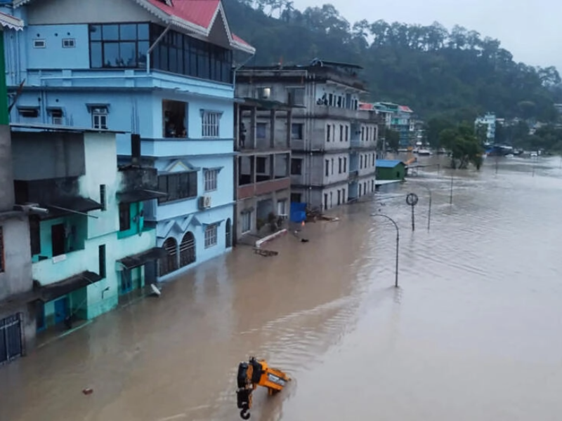 a flooded street in lachen valley in india s sikkim state on october 4 2023 following a flash flood caused by intense rainfall photo afp