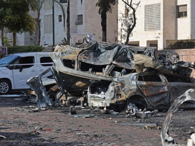 a picture taken after a rocket attack from the gaza strip into israel on october 7 2023 shows burnt out vehicles in the southern israeli city of ashkelon afp