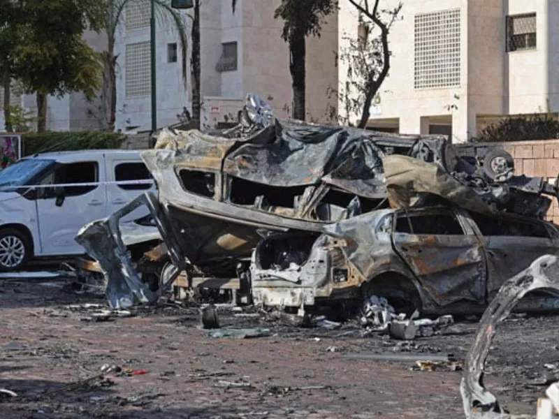 a picture taken after a rocket attack from the gaza strip into israel on october 7 2023 shows burnt out vehicles in the southern israeli city of ashkelon afp