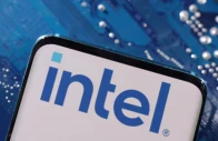a smartphone with an intel logo displayed is placed on a computer motherboard in this illustration source reuters