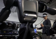 an engineer wearing vr goggles uses a controller to operate a spirit ai s moz1 robot at a testing area in the company s headquarters in beijing china september 17 2026 photo reuters