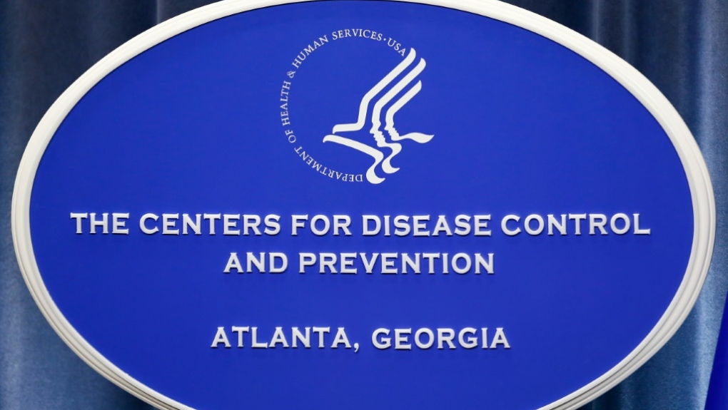 a sign with the logo for the centers for disease control and prevention at the tom harkin global communications center in atlanta georgia afp