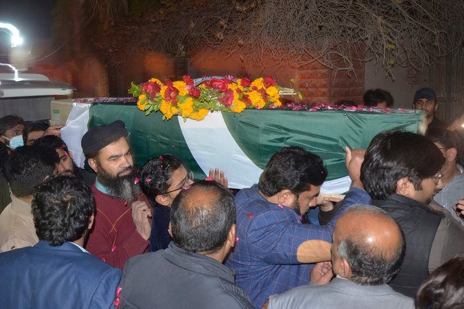 relatives carry the coffin of a young pakistani military officer who was killed during attacks by militants on a security camp in naushki district of balochistan province on feb 3 2022 photo afp