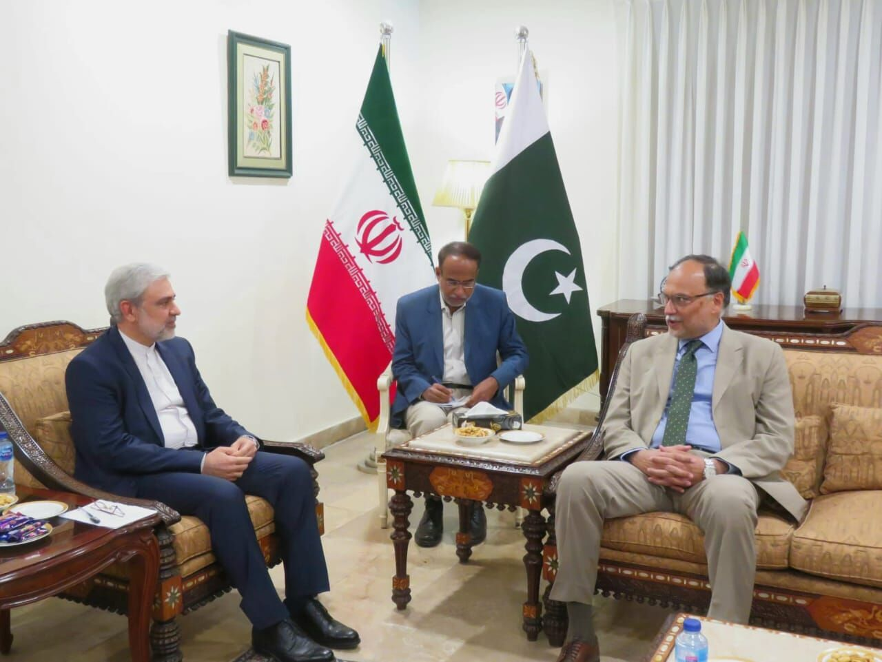minister for development and planning ahsan iqbal meets iranian ambassador in islamabad