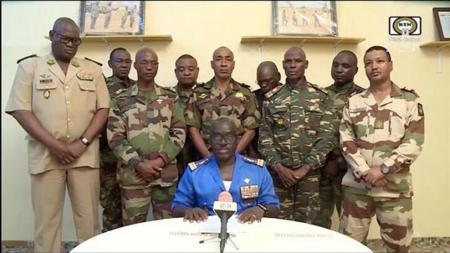 niger army spokesman colonel major amadou adramane speaks during an appearance on national television after president mohamed bazoum was held in the presidential palace in niamey niger july 26 2023 in this still image taken from video photo reuters niger army spokesman colonel major amadou adramane speaks during an appearance on national television after president mohamed bazoum was held in the presidential palace in niamey niger july 26 2023 in this still image taken from video photo reuters