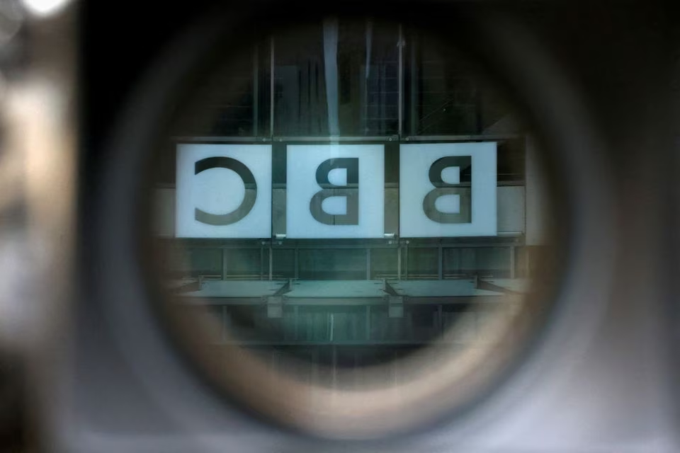 a bbc logo is reflected in the viewfinder of a television camera outside the british broadcasting corporation bbc headquarters in london britain march 13 2023 photo reuters