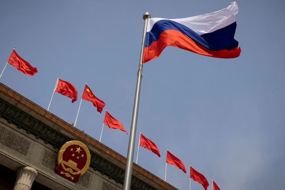 the russian flag flies in front of the great hall of the people before a welcoming ceremony for russian prime minister mikhail mishustin in beijing china may 24 2023 photo reuters file