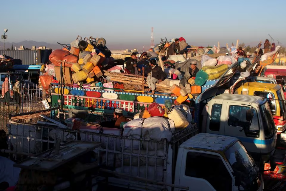 afghan nationals with belongings sit atop a truck as they head back with their families to afghanistan from pakistan at the chaman border crossing along the pakistan afghanistan border in balochistan november 10 2023 photo reuters