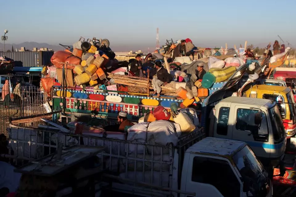 afghan nationals with belongings sit atop a truck as they head back with their families to afghanistan from pakistan at the chaman border crossing along the pakistan afghanistan border in balochistan november 10 2023 photo reuters afghan nationals with belongings sit atop a truck as they head back with their families to afghanistan from pakistan at the chaman border crossing along the pakistan afghanistan border in balochistan november 10 2023 photo reuters