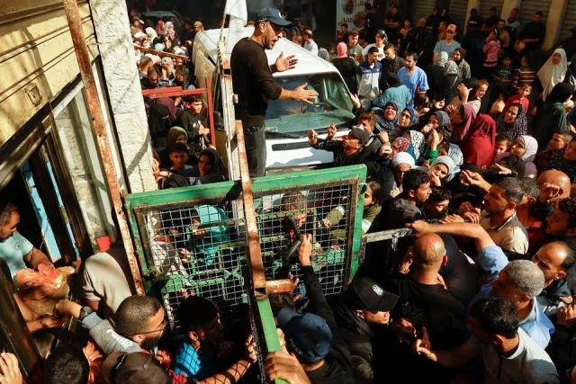 palestinians queue as they wait to buy bread from a bakery amid shortages of food supplies and fuel as the conflict between israel and palestinian group hamas continues in khan younis in the southern gaza strip november 17 2023 photo reuters palestinians queue as they wait to buy bread from a bakery amid shortages of food supplies and fuel as the conflict between israel and palestinian group hamas continues in khan younis in the southern gaza strip november 17 2023 photo reuters
