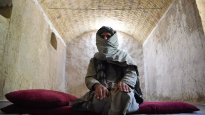the afghan police team welcoming back taliban fighters