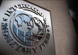 imf links bailout package to 12b debt rollover