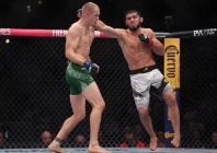 islam makhachev red gloves fights against iah machado garry blue gloves in the welterweight title bout during ufc 330 at xfinity mobile arena on august 16 2026 photo reuters