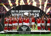 martin odegaard lifts the trophy as he celebrates with team mates after winning the fa community shield at the principality stadium in cardiff photo reuters
