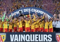 lens players lift the french super cup photo afp