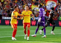lens florian thauvin celebrates scoring their fifth goal with thorgan hazard against auxerre at stade bollaert delelis lens photo reuters