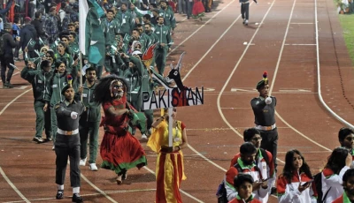 pakistani athletes take part in the closing ceremony of the 13th south asian games sag in kathmandu on december 10 2019 photo afp