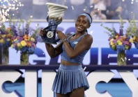 coco gauff celebrates with the rookwood cup after defeating jessica pegula during the women s final on day twelve of the cincinnati open photo afp