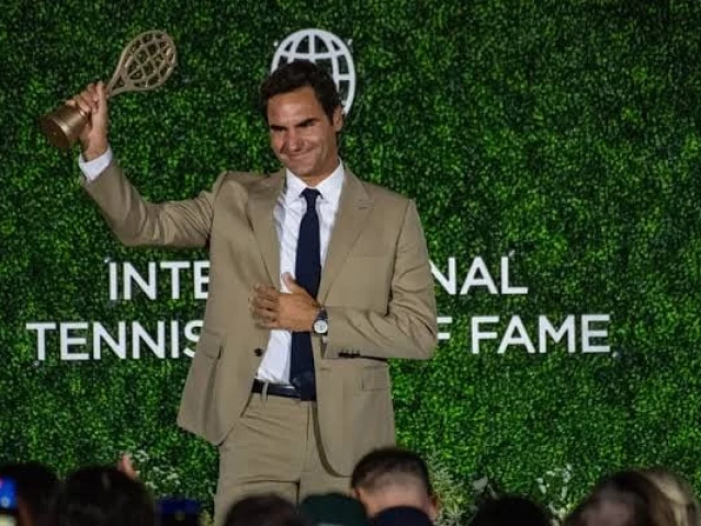 roger federer accepts his induction into the international tennis hall of fame during a ceremony in newport photo afp roger federer accepts his induction into the international tennis hall of fame during a ceremony in newport photo afp