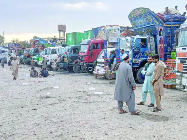 trucks loaded with refugees belongings queue at the torkham border ahead of their return to afghanistan photo express trucks loaded with refugees belongings queue at the torkham border ahead of their return to afghanistan photo express