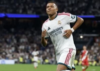 real madrid s kylian mbappe scores his team s fourth goal against rayo vallecano at santiago bernabeu stadium in madrid photo afp